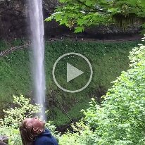 Tucker swallows the waterfall in Oregon